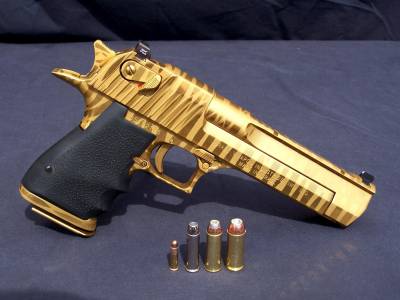 Золотой пистолет